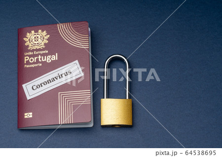 Portuguese european travel passport with padlock on blue background. 64538695