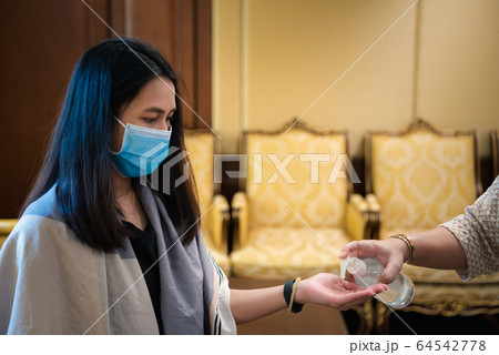 Woman wearing mask protection epidemic flu covid19 Woman wearing mask protection epidemic flu covid19 64542778