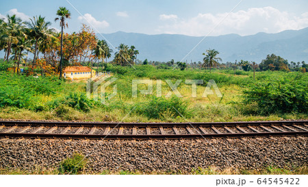 South india nature view at summer day from train 64545422