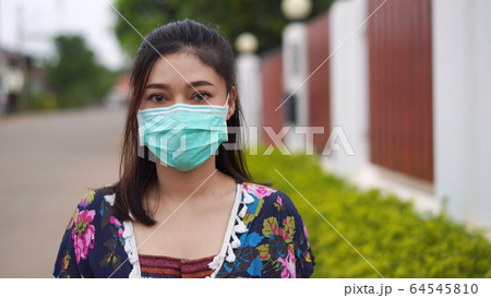 woman in medical mask(surgical mask), coronavirus woman in medical mask(surgical mask), coronavirus 64545810