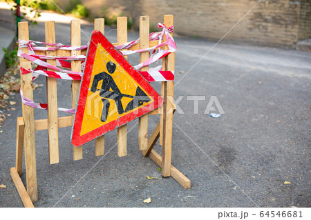 Road repair. Warning signs about repair work of a 64546681