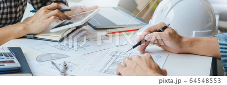 Cooperation Corporate designers in the office are Cooperation Corporate designers in the office are 64548553