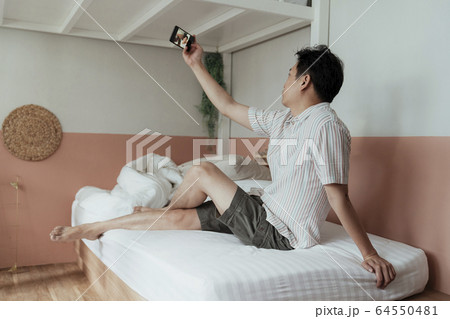 A selfie on the bed of asian gay. A selfie on the bed of asian gay. 64550481