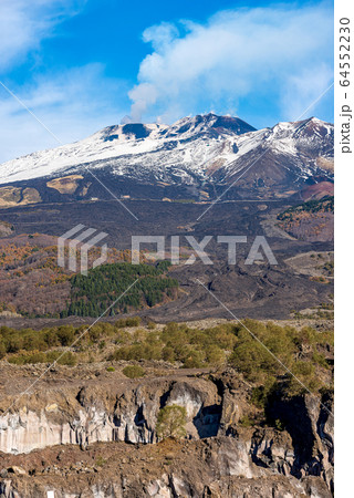 Mount Etna volcano with smoke - Sicily island Italy Europe Mount Etna volcano with smoke - Sicily island Italy Europe 64552230