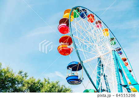 Colorful ferris wheel at amusement park in Vladivostok, Russia 64555206