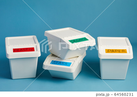 Labeled Waste Containers on Blue 64560231