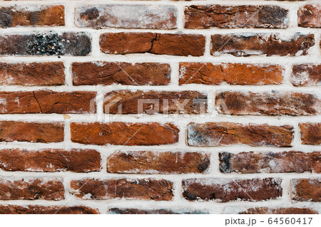 Grunge background with red  bricks 64560417