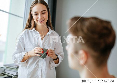 attractive lady nicely talk with husband in the morning attractive lady nicely talk with husband in the morning 64562178