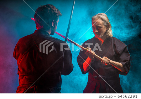 young student learn how to fight with Kendo Sword 64562291