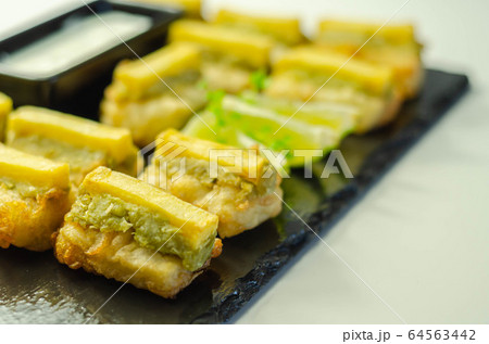 Skinless and boneless battered Alaska Pollock Skinless and boneless battered Alaska Pollock 64563442