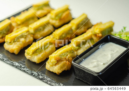 Skinless and boneless battered Alaska Pollock Skinless and boneless battered Alaska Pollock 64563449