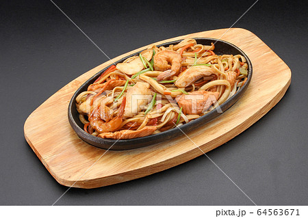 Udon noodles with seafood. Thai cuisine. Udon noodles with seafood. Thai cuisine. 64563671