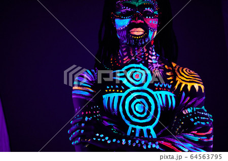 mysterious male with fluorescent body art mysterious male with fluorescent body art 64563795
