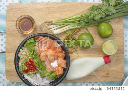 Thai spicy salmon salad with vegetable and herb Thai spicy salmon salad with vegetable and herb 64563852