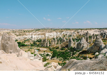 Cavusin old village, cave town in Cappadocia, Turkey 64564152