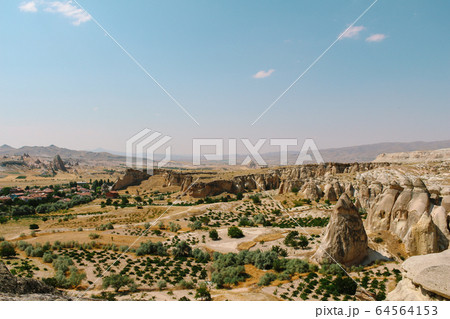 Cavusin old village, cave town in Cappadocia, Turkey Cavusin old village, cave town in Cappadocia, Turkey 64564153
