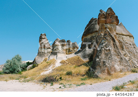 Pasabag valley Mushroom shaped rock formation, fairy chimneys in Cappadocia, Turkey Pasabag valley Mushroom shaped rock formation, fairy chimneys in Cappadocia, Turkey 64564267