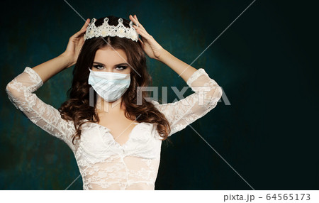 Perfect fashion woman in medical face mask  64565173