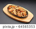 Soba noodles with seafood. Thai cuisine. 64565353