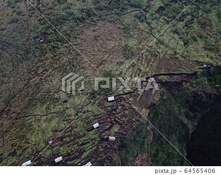 The Sunrise On The Volcano Batur On The Island Of Bali In Indonesia 64565406