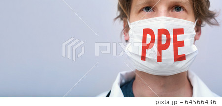 PPE theme with person wearing a protective face mask 64566436