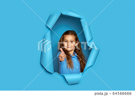 caucasian little cild girl showing thumbs up caucasian little cild girl showing thumbs up 64566666