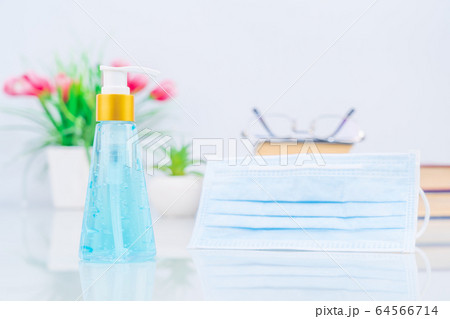 Surgical mask ,Medical face masks and Alcohol gel bottle sanitizer hand for anti bacteria  on deck 64566714