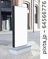 Blank white vertical pylon stand mockup brick building, side view Blank white vertical pylon stand mockup brick building, side view 64566776