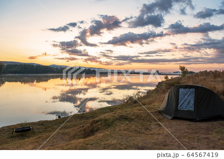 Carp fishing rods at sunrise. Carp fishing rods at sunrise. 64567419