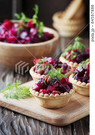 Traditional russian vegan salad with potato and 64567886