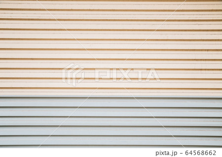 Beige and gray color shutter door background 64568662