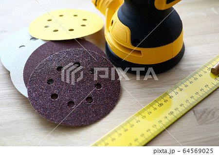 Carpenters electrical tool on desk 64569025