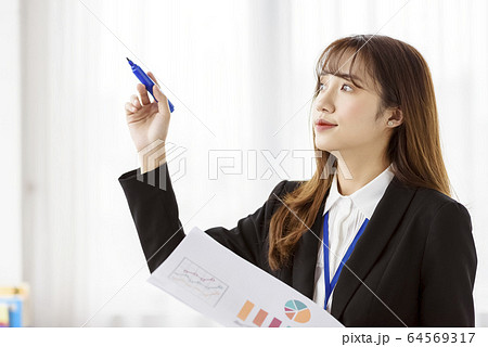 Business scene female 64569317