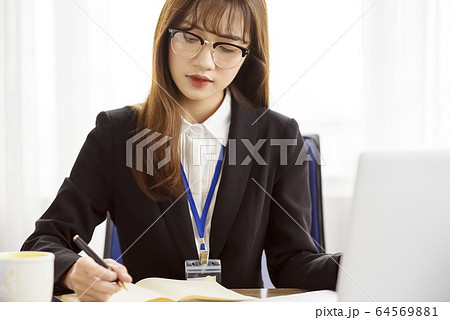 Business scene female 64569881