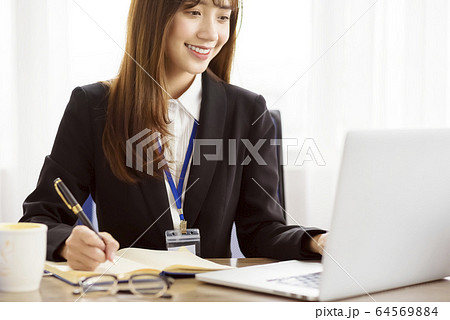 Business scene female 64569884