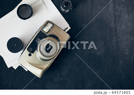 Old retro film camera. 64571605