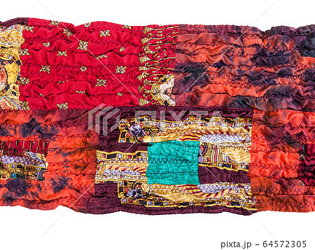 part of stitched red patchwork scarf isolated 64572305