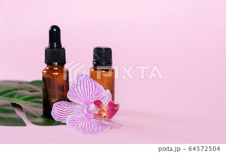 Essential oils , various bottles aromatherapy on a 64572504