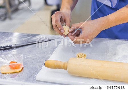 Process of preparing dough at bakery, restaurant 64572918