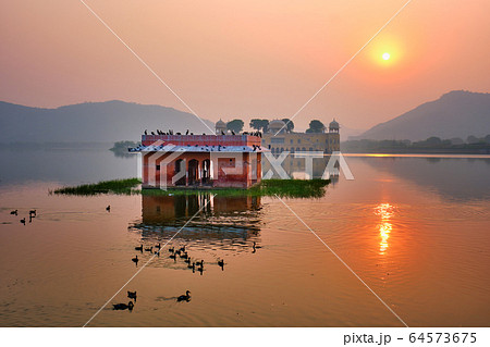 Tranquil morning at Jal Mahal Water Palace at sunrise in Jaipur. Rajasthan, India Tranquil morning at Jal Mahal Water Palace at sunrise in Jaipur. Rajasthan, India 64573675