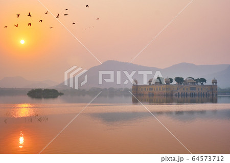 Tranquil morning at Jal Mahal Water Palace at sunrise in Jaipur. Rajasthan, India Tranquil morning at Jal Mahal Water Palace at sunrise in Jaipur. Rajasthan, India 64573712