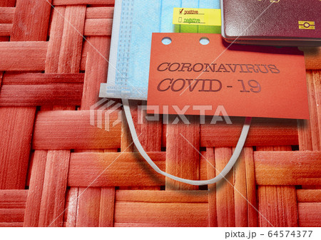 Note CORONAVIRUS COVID-19  and passport. Novel corona virus outbreak.Border control and quarantine of tourists infected with coronavirus. 64574377