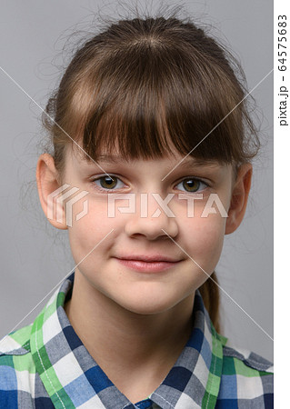 Portrait of a happy ten year old girl of European Portrait of a happy ten year old girl of European 64575683
