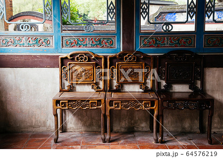 Chinese traditional style chair and interior at Lin Family Mansion and Garden in Taipei, Taiwan Chinese traditional style chair and interior at Lin Family Mansion and Garden in Taipei, Taiwan 64576219