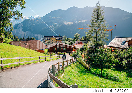 Wengen village and alps nature view in Switzerland 64582266