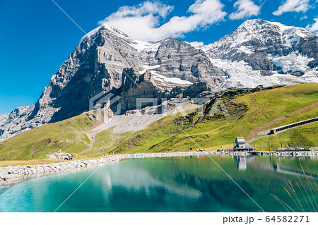 Fallbodensee lake and snowy mountain at Jungfrau region in Switzerland 64582271