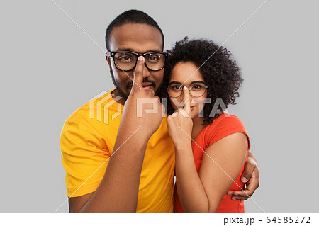 happy african american couple in glasses hugging happy african american couple in glasses hugging 64585272