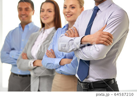 close up of smiling business people at office 64587210