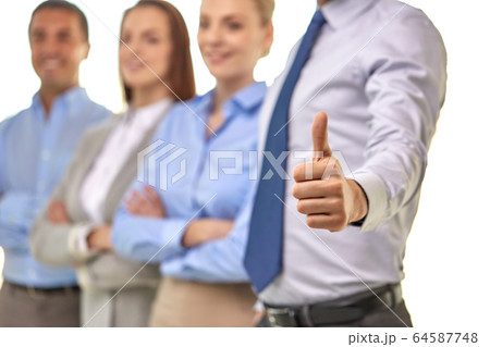 close up of businessman showing thumbs up 64587748