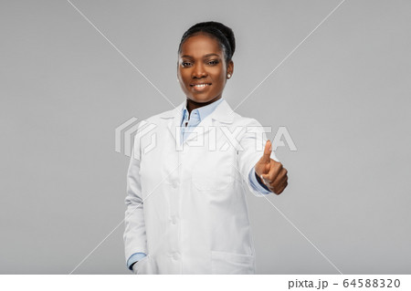 african american female doctor showing thumbs up 64588320
